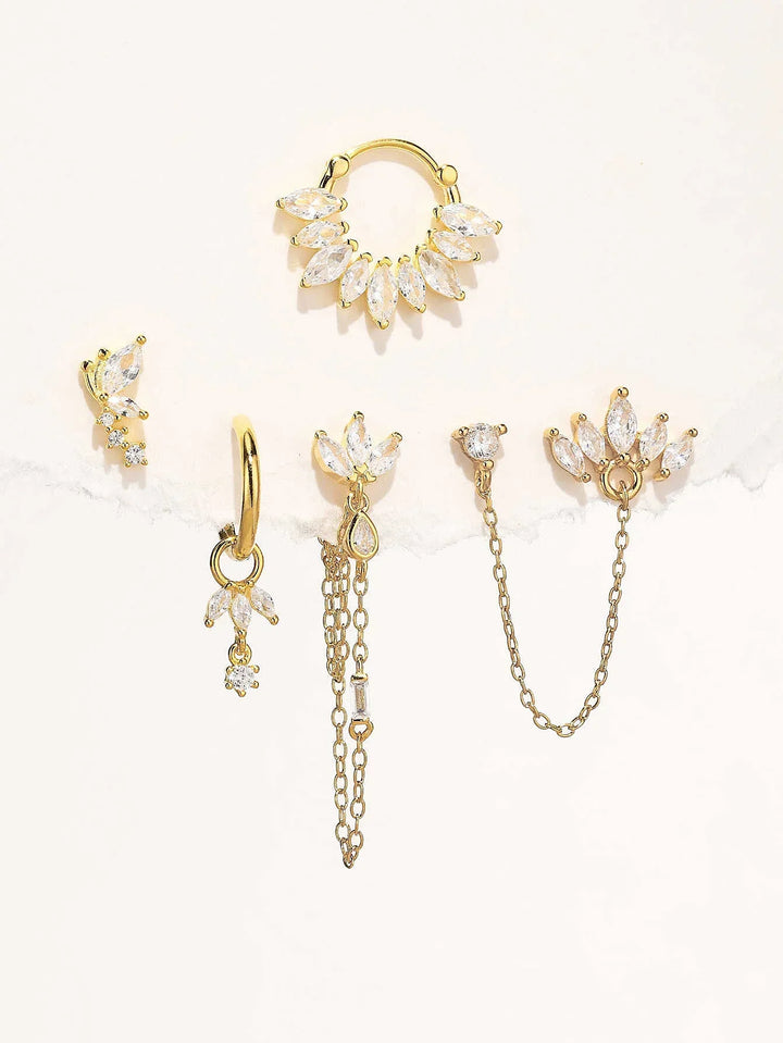 Daniela – Jemné zlaté náušnice s plynulým tvarem.