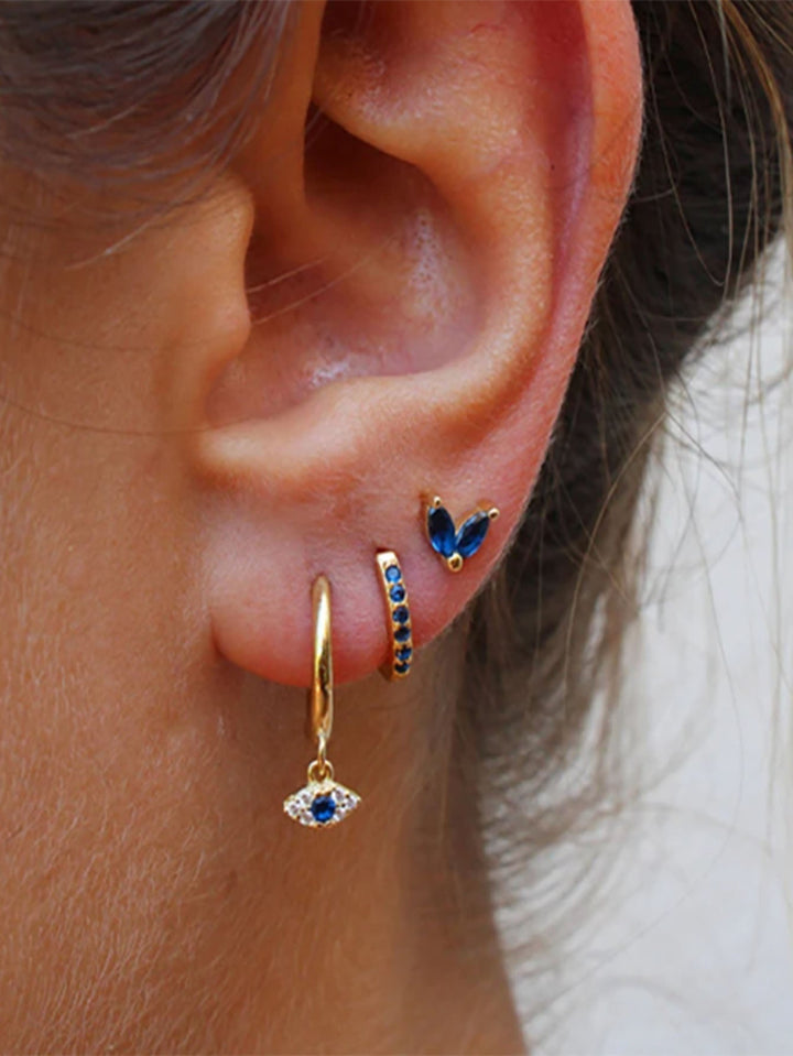 Leandra – Zlaté náušnice s rafinovaným tvarem.