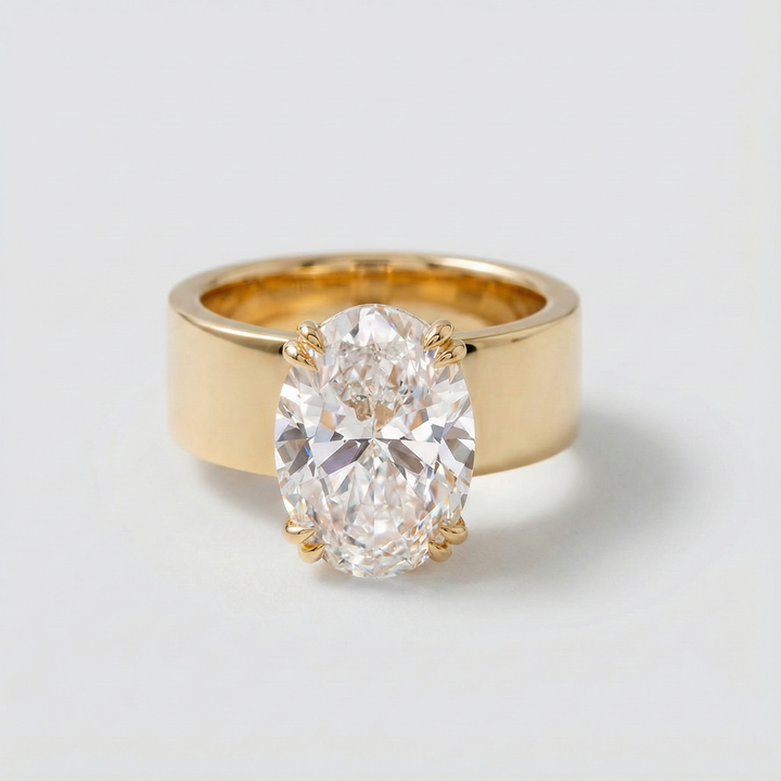 Lara – Solitaire prsten s kulatým kamenem ve zlatém provedení.